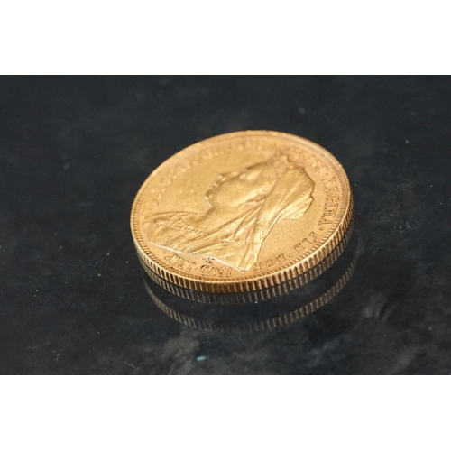 3 - A British Queen Victoria Veiled Head full gold sovereign coin, dated 1895 with Melbourne mint mark.