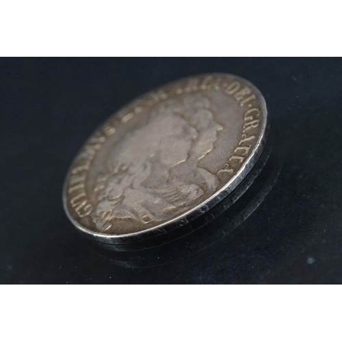 128 - A British 1691 Silver Half Crown, features second laureate conjoined busts of King William III and Q... 