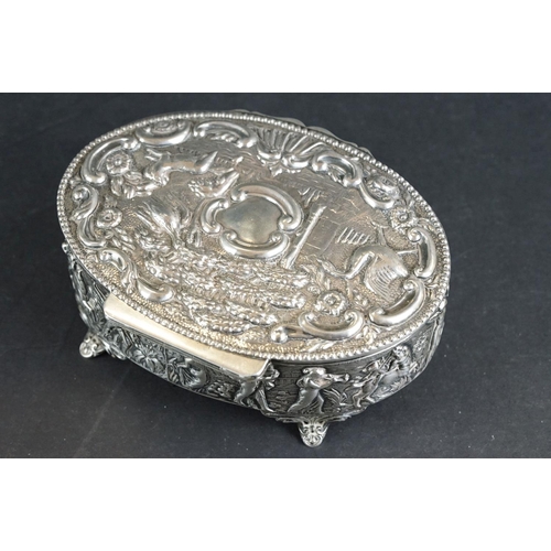 523 - Late Victorian silver lidded trinket box, the hinged lid with repoussé bird and animal decoration, f... 