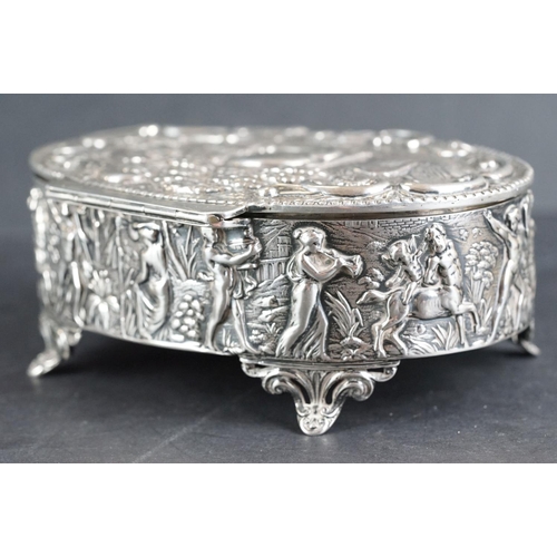 523 - Late Victorian silver lidded trinket box, the hinged lid with repoussé bird and animal decoration, f... 