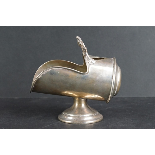 526 - Silver sugar bowl modelled as a coal scuttle with scoop, plain polished body with ribbed border, mou... 