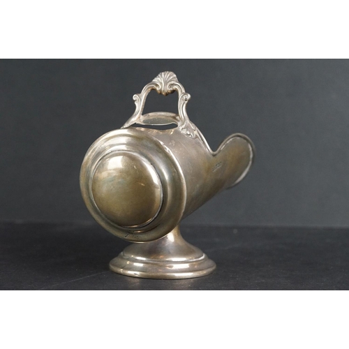 526 - Silver sugar bowl modelled as a coal scuttle with scoop, plain polished body with ribbed border, mou... 