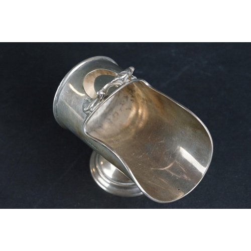 526 - Silver sugar bowl modelled as a coal scuttle with scoop, plain polished body with ribbed border, mou... 