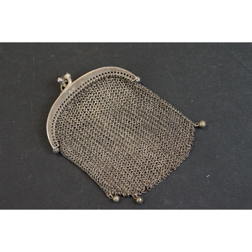 534 - Continental silver chainmail purse with London import marks; a similar silver chainmail coin purse w... 