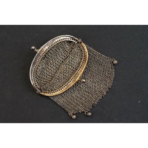 534 - Continental silver chainmail purse with London import marks; a similar silver chainmail coin purse w... 