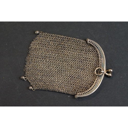 534 - Continental silver chainmail purse with London import marks; a similar silver chainmail coin purse w... 