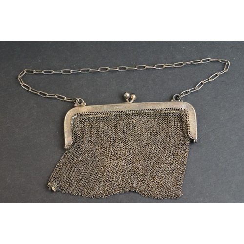 534 - Continental silver chainmail purse with London import marks; a similar silver chainmail coin purse w... 