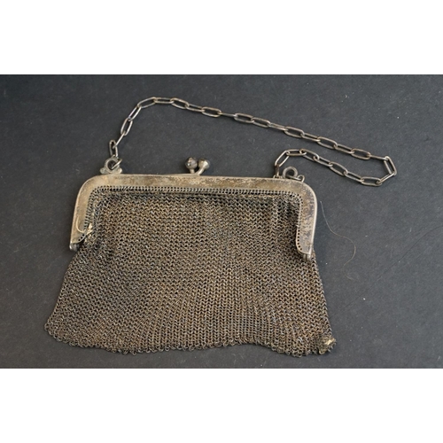 534 - Continental silver chainmail purse with London import marks; a similar silver chainmail coin purse w... 