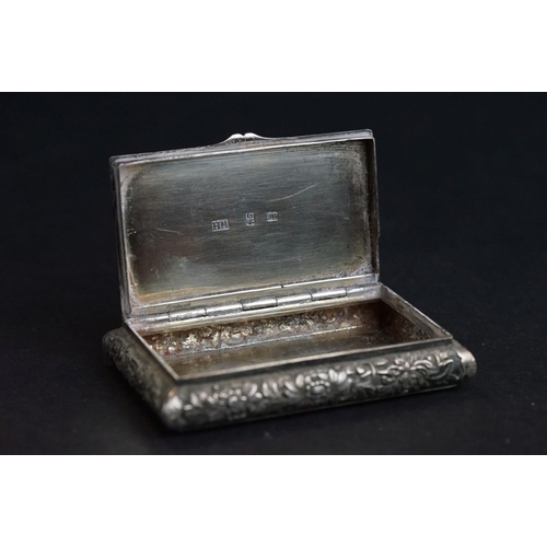 535 - Chinese silver snuff box, the hinged lid with cast Chinese woodland scene depicting Elders playing b... 