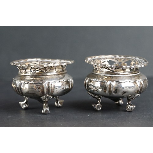 541 - Pair of Edwardian silver open salt cellars, pierced foliate rim, ribbed detailing to the body, raise... 