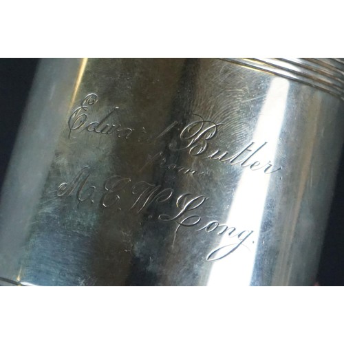 513 - Late Victorian silver tankard of plain polished form, with scrolling handle, presentation inscriptio... 