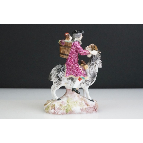 4 - 19th Century Dresden porcelain figure of a tailor riding a Billy goat with gilt scrolling decoration... 