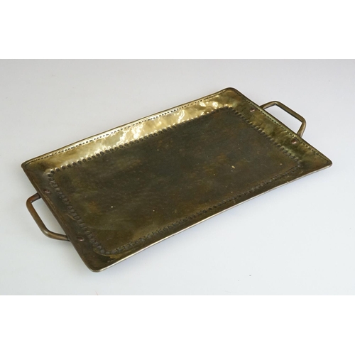 114 - John Pearson Arts & Crafts twin-handled hammered brass tray of rectangular form, impressed J.P to ba... 