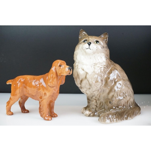 24 - Collection of nine porcelain animal figures to include a boxed Royal Doulton Animals Chow Chow no. 1... 