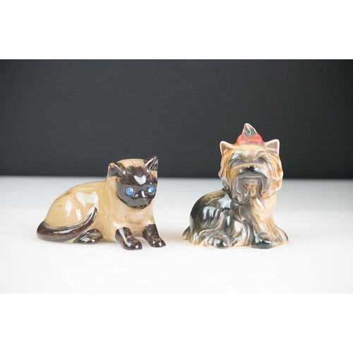 24 - Collection of nine porcelain animal figures to include a boxed Royal Doulton Animals Chow Chow no. 1... 