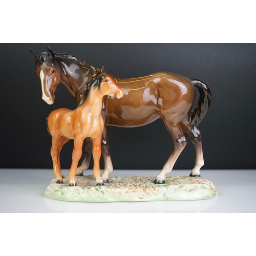 29 - Three Beswick porcelain horse figures to include 2 x 1014 Rearing Welsh Cobs and a horse & pony figu... 