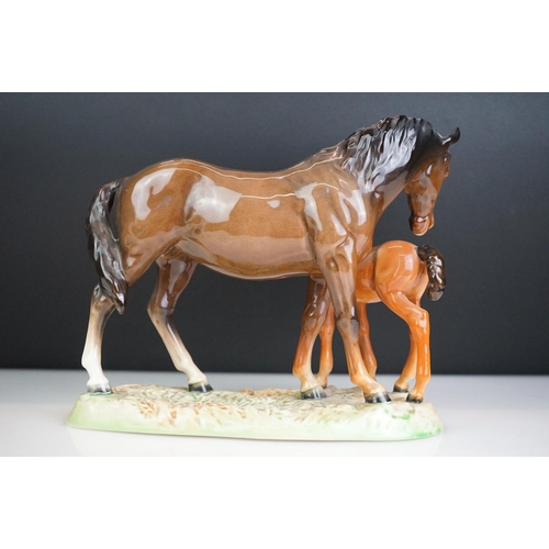 29 - Three Beswick porcelain horse figures to include 2 x 1014 Rearing Welsh Cobs and a horse & pony figu... 