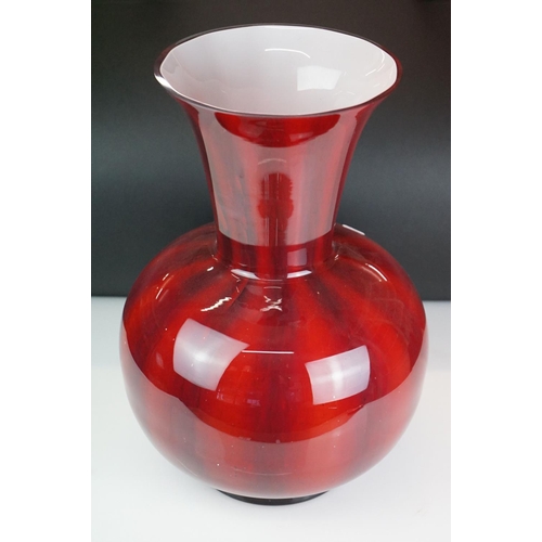 35 - Large contemporary red glass floor vase of baluster form, with white interior, approx 46.5cm high