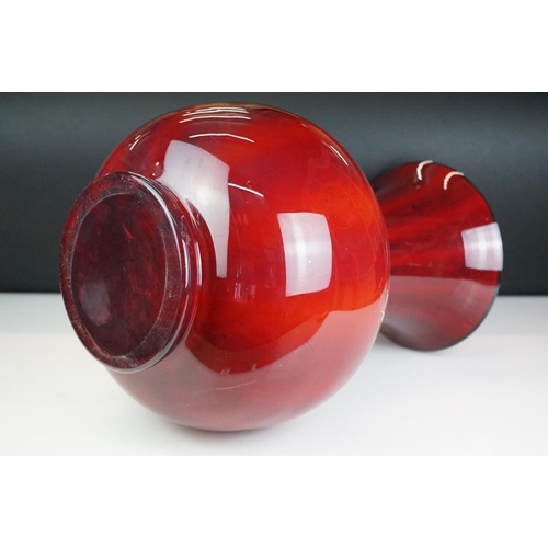 35 - Large contemporary red glass floor vase of baluster form, with white interior, approx 46.5cm high