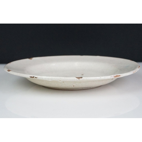 54 - Continental cream glazed pottery dish, entitled ' TIBAES ' approx. 23cm diameter