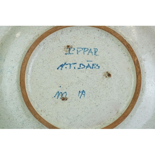 54 - Continental cream glazed pottery dish, entitled ' TIBAES ' approx. 23cm diameter