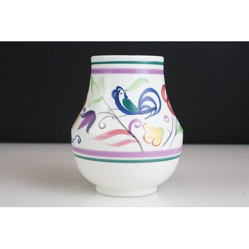 56 - Poole Pottery tapering vase with polychrome floral and scrolling decoration, approx 12.5cm high, tog... 