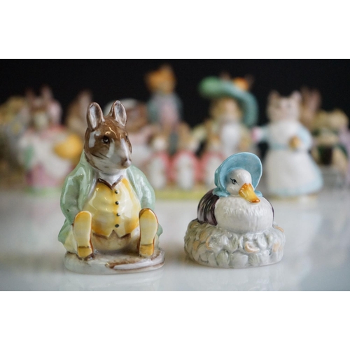 67 - Collection of Beswick Beatrix Potter figurines, to include Mrs Rabbit 1951, Mr Jackson 1974 (Royal A... 