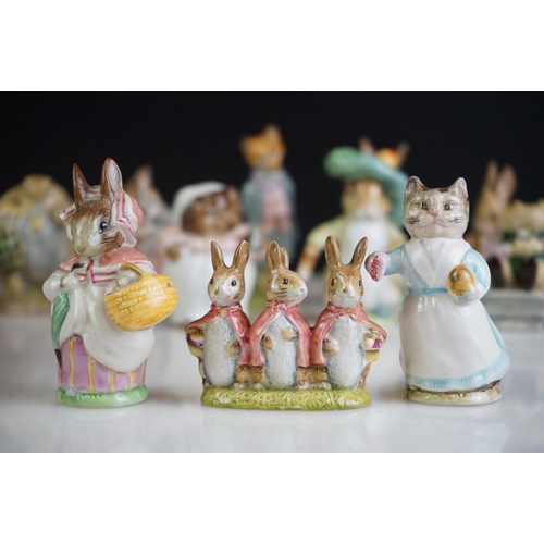 67 - Collection of Beswick Beatrix Potter figurines, to include Mrs Rabbit 1951, Mr Jackson 1974 (Royal A... 