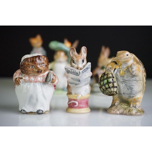 67 - Collection of Beswick Beatrix Potter figurines, to include Mrs Rabbit 1951, Mr Jackson 1974 (Royal A... 