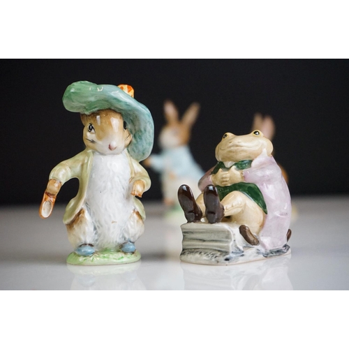 67 - Collection of Beswick Beatrix Potter figurines, to include Mrs Rabbit 1951, Mr Jackson 1974 (Royal A... 