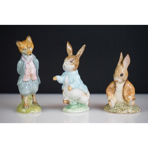 67 - Collection of Beswick Beatrix Potter figurines, to include Mrs Rabbit 1951, Mr Jackson 1974 (Royal A... 