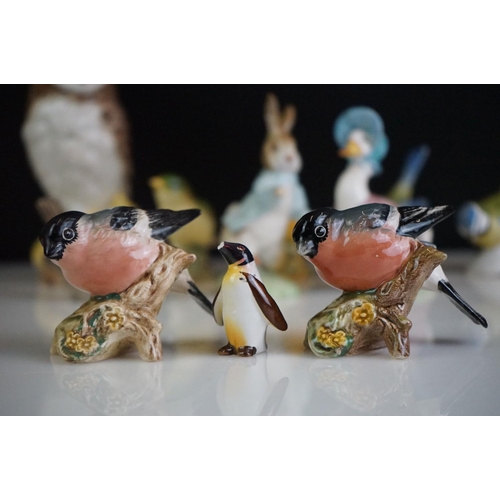 68 - Collection of 13 porcelain bird figures to include six Beswick no. 1042 Bullfinches, two Beswick Gre... 