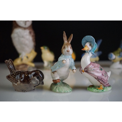 68 - Collection of 13 porcelain bird figures to include six Beswick no. 1042 Bullfinches, two Beswick Gre... 