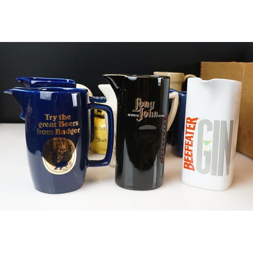 85 - Collection of 39 branded ceramic advertising water jugs to include many whisky examples, to include ... 