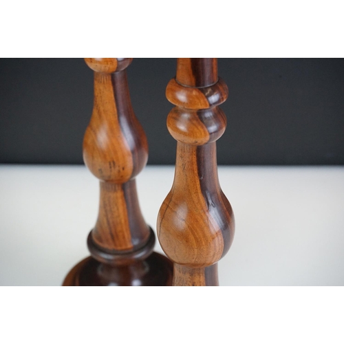 95 - Pair of large late 19th century lignum vitae turned candlesticks with brass drip tray and sconces