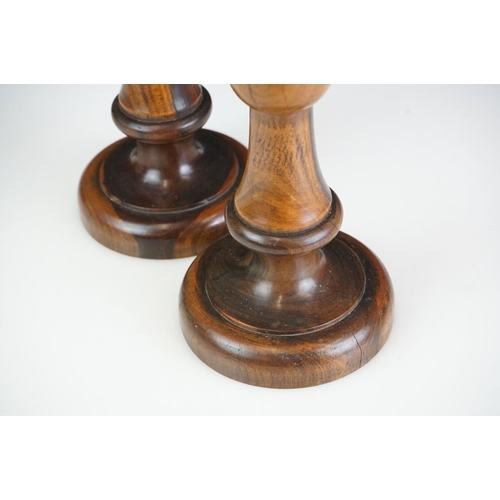 95 - Pair of large late 19th century lignum vitae turned candlesticks with brass drip tray and sconces