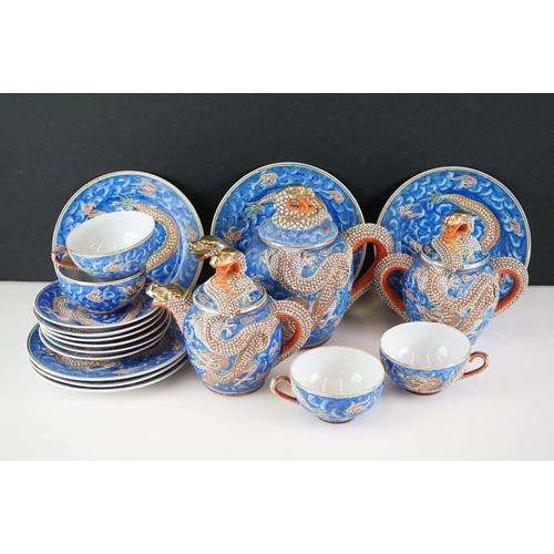 44 - Vintage Japanese moriage hand-painted dragon Kutani tea ware to include 2 lidded teapots (one lid a/... 