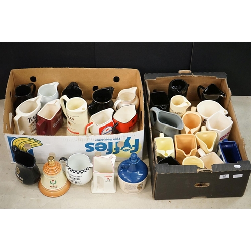 80 - Collection of 29 branded ceramic advertising water jugs to include many whisky examples, to include ... 