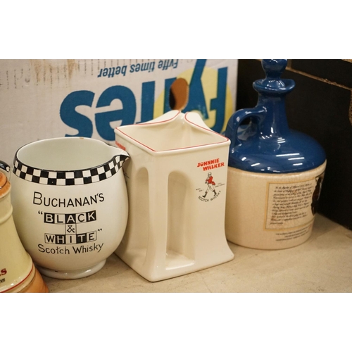 80 - Collection of 29 branded ceramic advertising water jugs to include many whisky examples, to include ... 