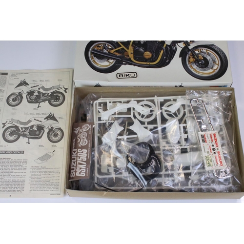 274 - Four boxed Tamiya plastic model motorbike kits to include 14055 Honda NSR500 Grand Prix Racer, 14054... 