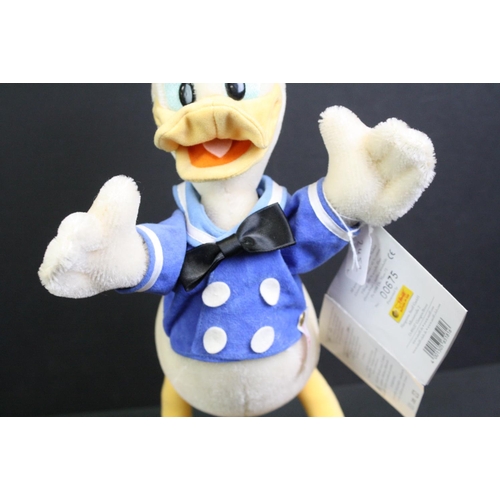 305 - Two Steiff Disney Showcase soft toys to include Donald and Daisy Duck, both with original buttons an... 