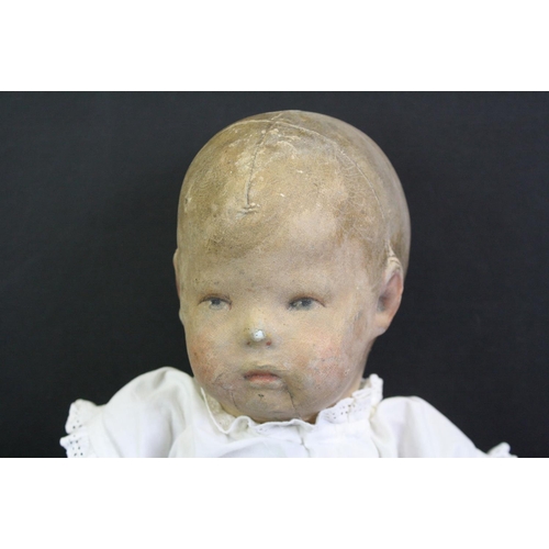 326 - Vintage fabric-covered baby doll dressed in a christening robe, with painted facial features, approx... 