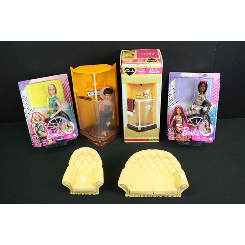 331 - Two boxed Mattel Barbie dolls in wheelchairs to include no. 165 & 166 plus a boxed Pedigree Sindy Sh... 