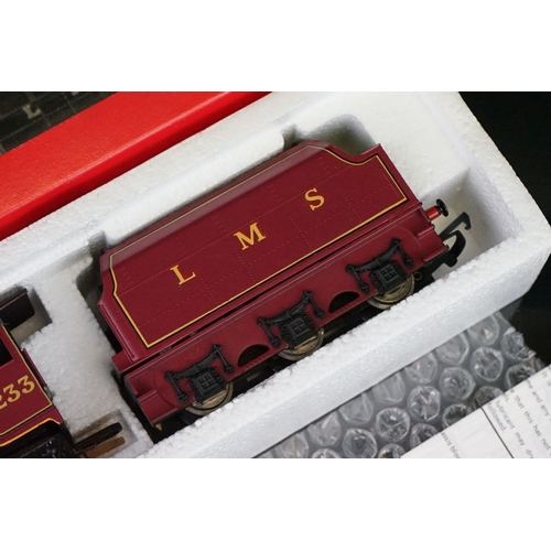 18 - Four boxed Hornby OO gauge locomotives to include R857 BR Loco Ivatt Class 2, R072 BR Class 25 Diese... 