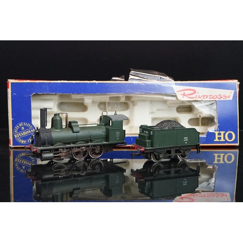 21 - Four boxed HO gauge locomotives to include Fleischmann 4300 and 3 x Rivarossi examples, condition va... 