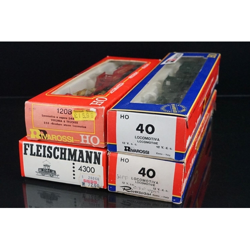 21 - Four boxed HO gauge locomotives to include Fleischmann 4300 and 3 x Rivarossi examples, condition va... 