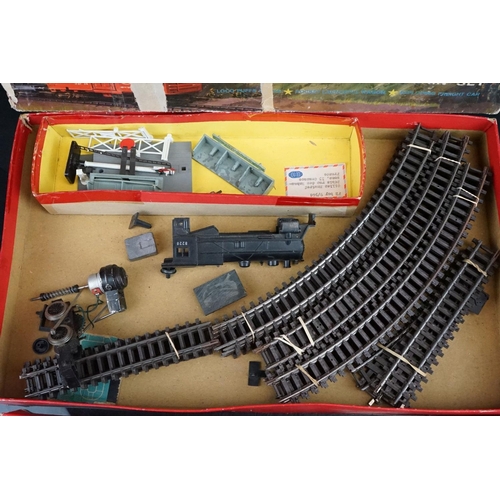 30 - Boxed and part complete Triang OO gauge RS65 train set containing boxed Rocket Launcher, boxed Explo... 