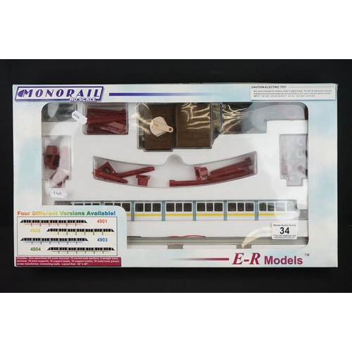 34 - Boxed ER Models HO gauge Monorail train set (appears complete) and a boxed Technic 9 Battery Operate... 