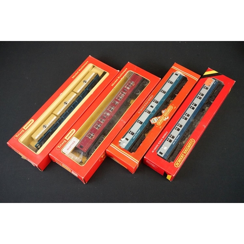 46 - 25 Boxed Hornby / Triang OO gauge items of rolling stock to include R416 Operating Mail Coach BR Liv... 