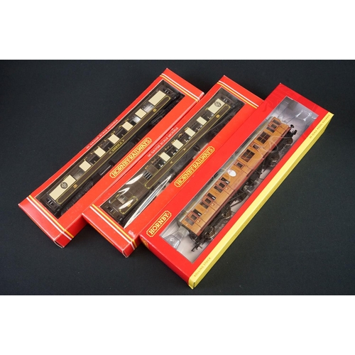 47 - 21 Boxed Hornby OO gauge items of rolling stock to include R4573, R4574, 4 x R233, R025 etc